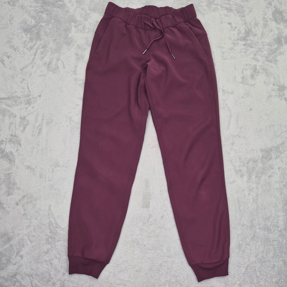 Lululemon On the Fly Jogger Burgundy Plum Drawstring Sweatpants Womens 6 Small
